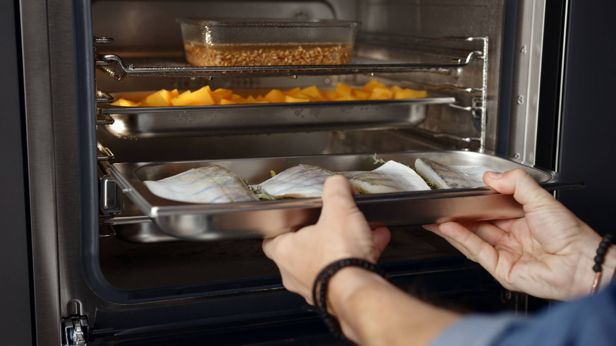 A latte macchiato being prepred with a Miele coffee machine 